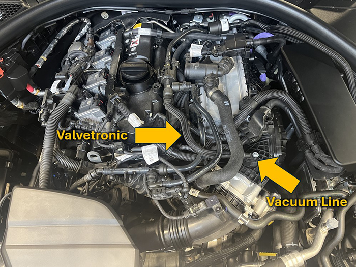 location of valvetronic and vacuum line in a BMW 2.0L (B48) Mild-hybrid GDI engine