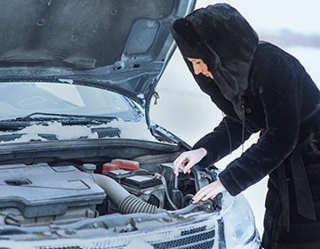 girl checking engine