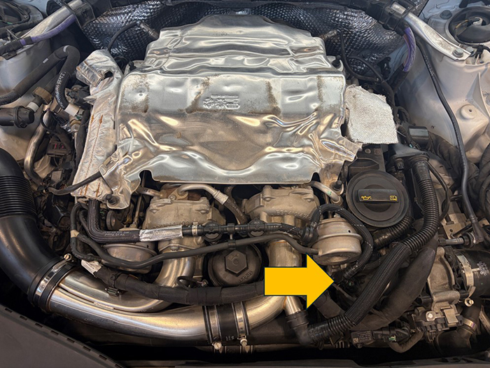 Vacuum line location on Porsche 2.9L Twin-turbocharged GDI engine.
