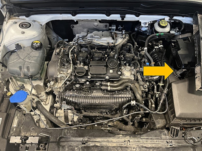 Arrow pointing to the MAF sensor on a Volvo B5 engine.